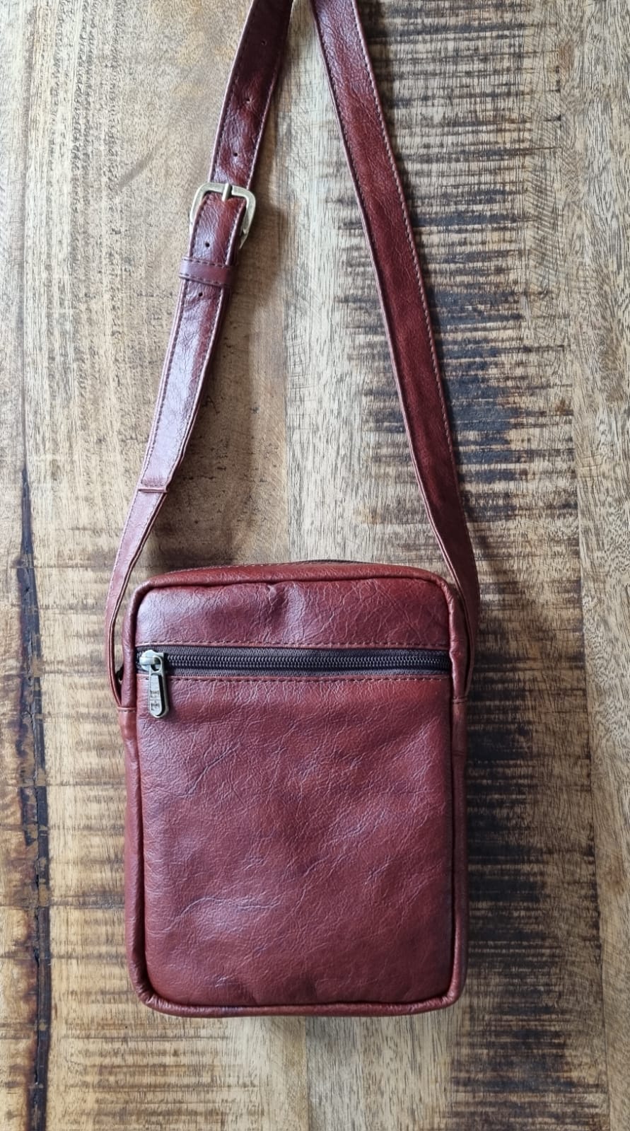 Urban-compact-sling-bag-leather-strap